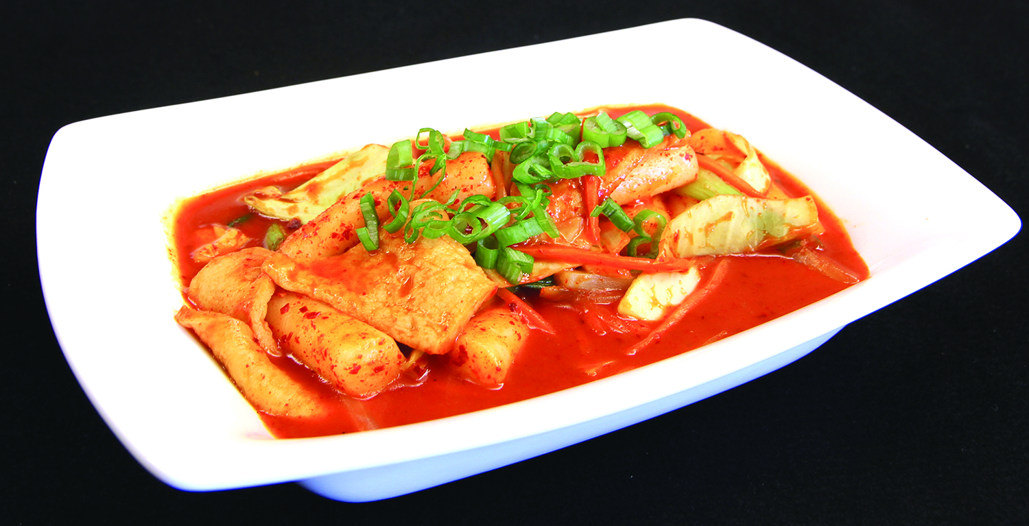 Spicy Rice Cake - Chewy rice cakes in spicy Korean sauce with vegetables